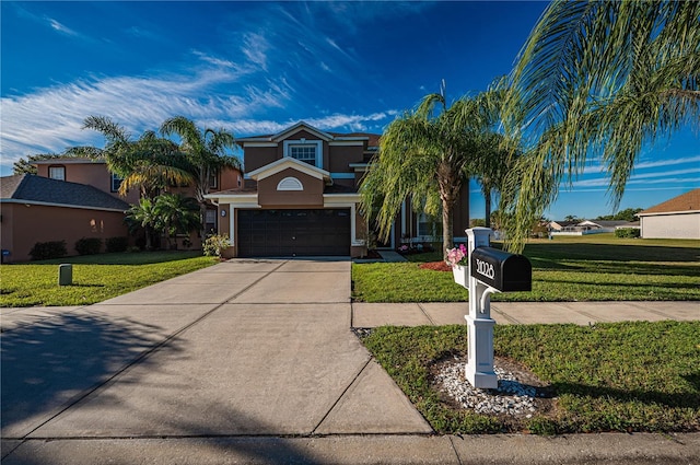 31028 Baclan Dr, Wesley Chapel, FL 33545 - view of front of house with stucco siding, a garage, concrete driveway, and a front yard