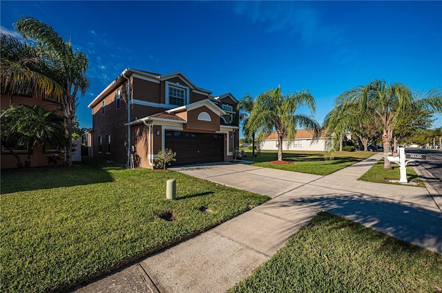 31028 Baclan Dr, Wesley Chapel, FL 33545 - view of front of house featuring a front yard, stucco siding, an attached garage, and driveway