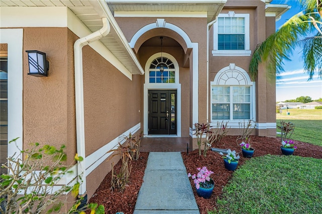 31028 Baclan Dr, Wesley Chapel, FL 33545 - property entrance featuring stucco siding