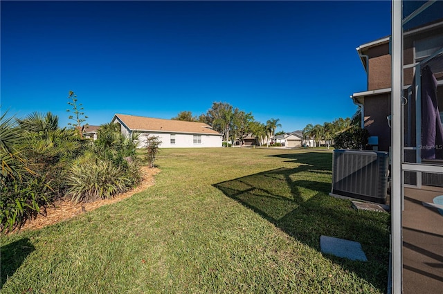 31028 Baclan Dr, Wesley Chapel, FL 33545 - view of yard featuring central AC unit