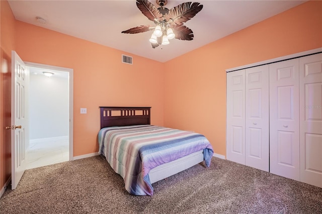 31028 Baclan Dr, Wesley Chapel, FL 33545 - carpeted bedroom featuring a closet, baseboards, ceiling fan, and visible vents