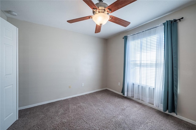 31028 Baclan Dr, Wesley Chapel, FL 33545 - carpeted spare room featuring baseboards and ceiling fan