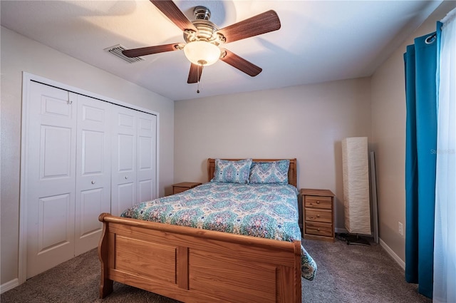 31028 Baclan Dr, Wesley Chapel, FL 33545 - bedroom featuring a closet, visible vents, baseboards, a ceiling fan, and dark colored carpet