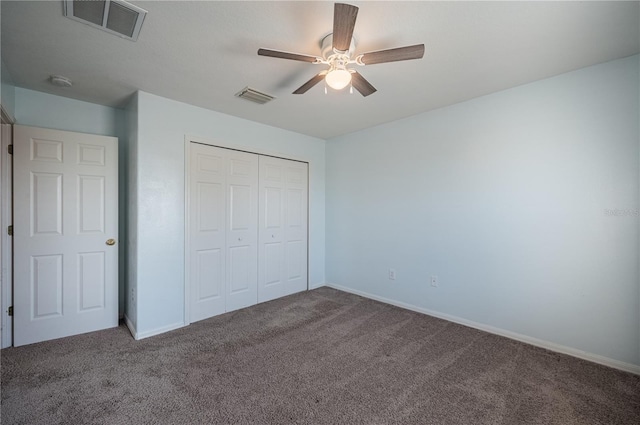 31028 Baclan Dr, Wesley Chapel, FL 33545 - unfurnished bedroom with visible vents, a closet, and carpet flooring