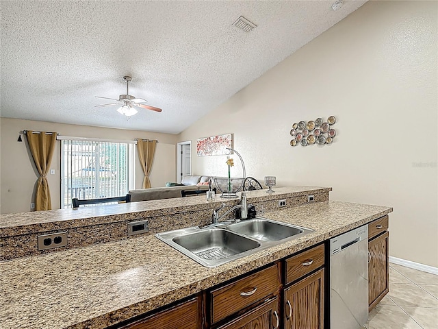 556 Hummingbird Ct, Kissimmee, FL 34759 - kitchen featuring visible vents, a ceiling fan, lofted ceiling, stainless steel dishwasher, and light tile patterned floors