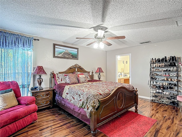 556 Hummingbird Ct, Kissimmee, FL 34759 - bedroom with a textured ceiling, visible vents, ceiling fan, and wood finished floors