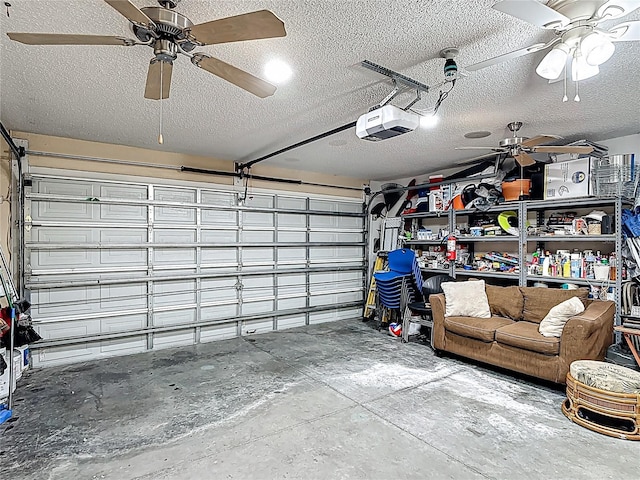 556 Hummingbird Ct, Kissimmee, FL 34759 - garage featuring a garage door opener and a ceiling fan