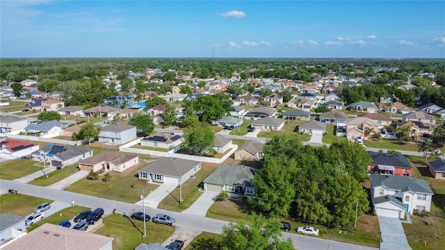 556 Hummingbird Ct, Kissimmee, FL 34759 - drone / aerial view with a residential view