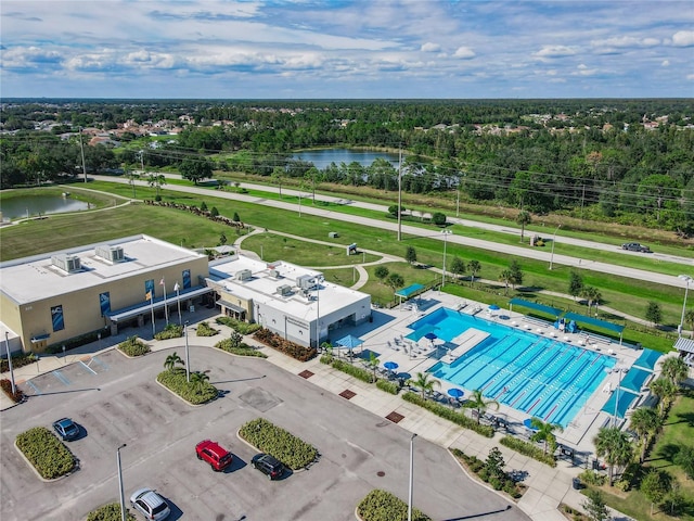 556 Hummingbird Ct, Kissimmee, FL 34759 - drone / aerial view featuring a water view and a forest view