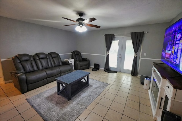 1491 Lavender St, Deltona, FL 32725 - living area with light tile patterned flooring, ceiling fan, baseboards, and french doors