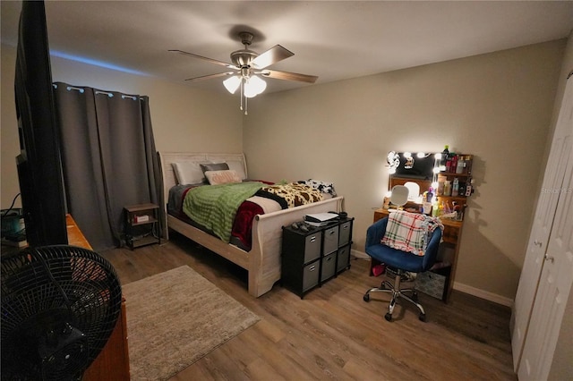 1491 Lavender St, Deltona, FL 32725 - bedroom featuring a ceiling fan, baseboards, and wood finished floors