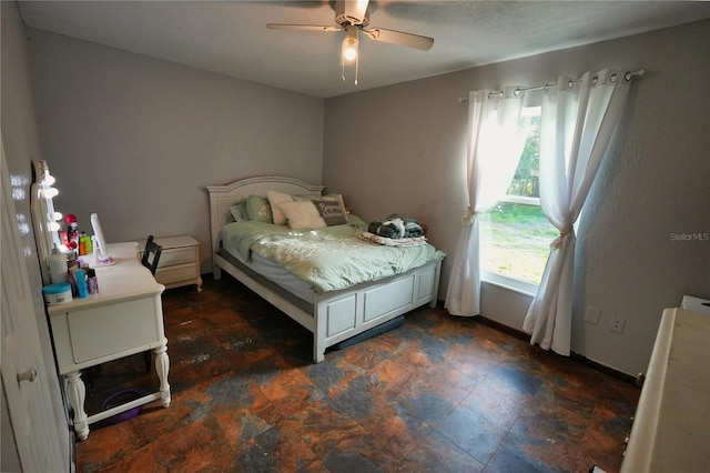1491 Lavender St, Deltona, FL 32725 - bedroom with baseboards and a ceiling fan