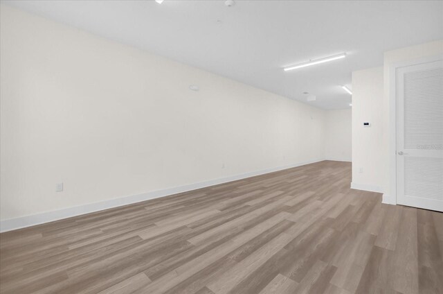 927 City Walk Ln, Oviedo, FL 32765 - empty room with baseboards and wood finished floors