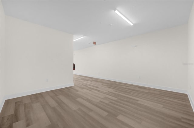 927 City Walk Ln, Oviedo, FL 32765 - empty room with baseboards and wood finished floors