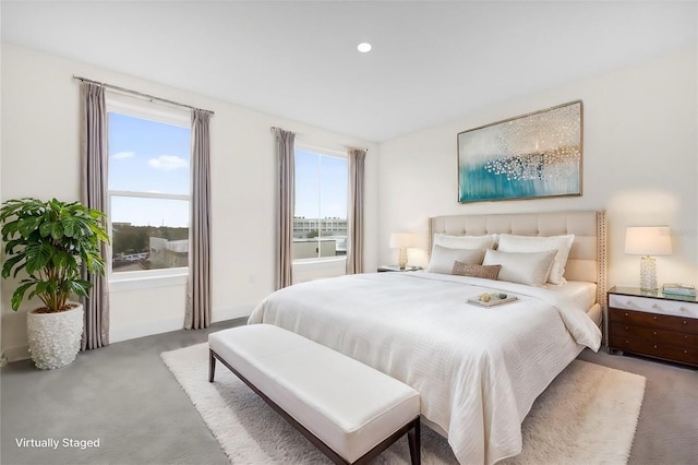 927 City Walk Ln, Oviedo, FL 32765 - carpeted bedroom featuring baseboards and multiple windows