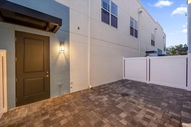 927 City Walk Ln, Oviedo, FL 32765 - view of patio featuring fence
