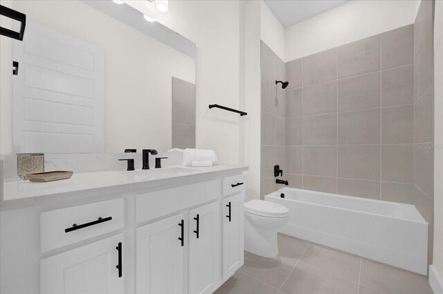 927 City Walk Ln, Oviedo, FL 32765 - full bath featuring tile patterned floors, toilet, vanity, and washtub / shower combination