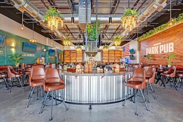 927 City Walk Ln, Oviedo, FL 32765 - bar featuring a bar and concrete floors