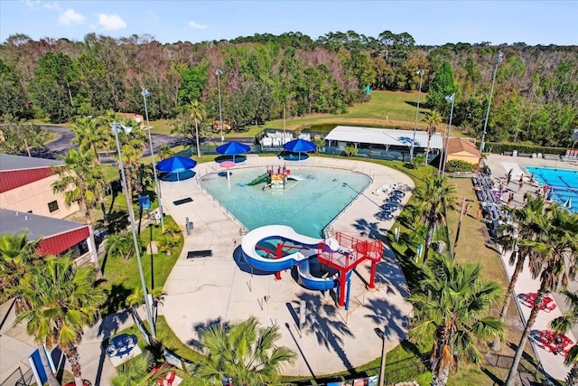 927 City Walk Ln, Oviedo, FL 32765 - aerial view with a wooded view
