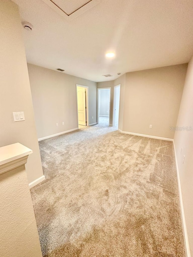 2834 Narcoossee Commons Way, Saint Cloud, FL 34771 - spare room with carpet, baseboards, and a smoke detector