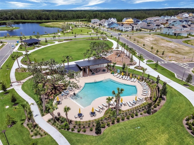 aerial view with a residential view and a water view