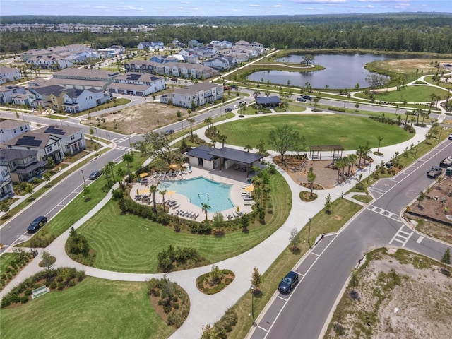 aerial view with a residential view and a water view