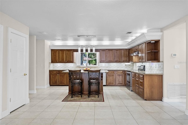 7706 Waunatta Ct, Winter Park, FL 32792 - kitchen with visible vents, tasteful backsplash, stainless steel electric range, and open shelves
