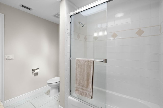 7706 Waunatta Ct, Winter Park, FL 32792 - full bathroom featuring tile patterned floors, toilet, bath / shower combo with glass door, baseboards, and visible vents