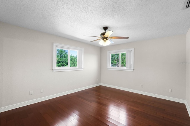 7706 Waunatta Ct, Winter Park, FL 32792 - unfurnished room featuring a ceiling fan, dark wood-style floors, baseboards, and a textured ceiling