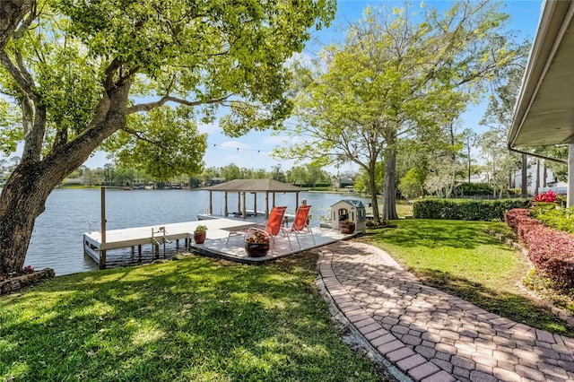 7706 Waunatta Ct, Winter Park, FL 32792 - dock area featuring a lawn and a water view
