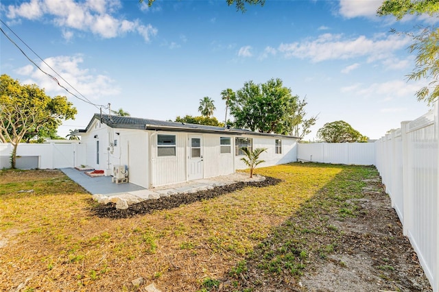 5980 32nd Ave N, Saint Petersburg, FL 33710 - back of property with a patio area and a gate