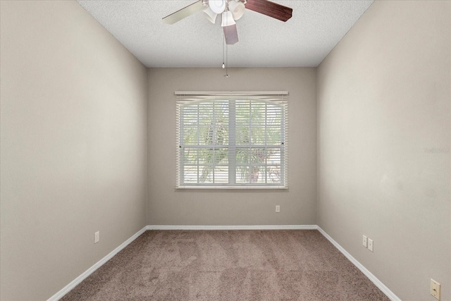 529 Tuten Trl, Orlando, FL 32828 - carpeted empty room featuring ceiling fan, baseboards, and a textured ceiling