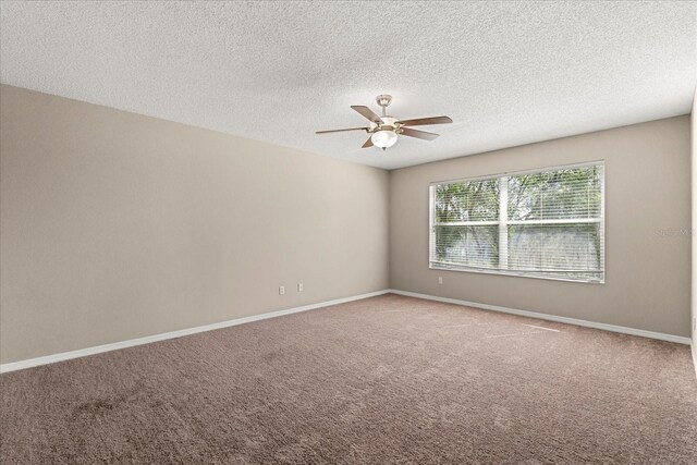 529 Tuten Trl, Orlando, FL 32828 - carpeted empty room featuring baseboards, a textured ceiling, and ceiling fan