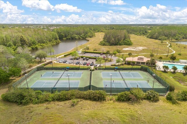 529 Tuten Trl, Orlando, FL 32828 - birds eye view of property with a view of trees and a water view