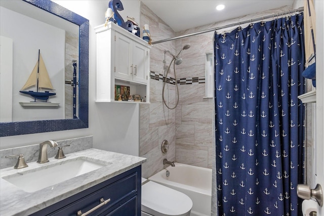 full bath featuring shower / bath combo, toilet, and vanity