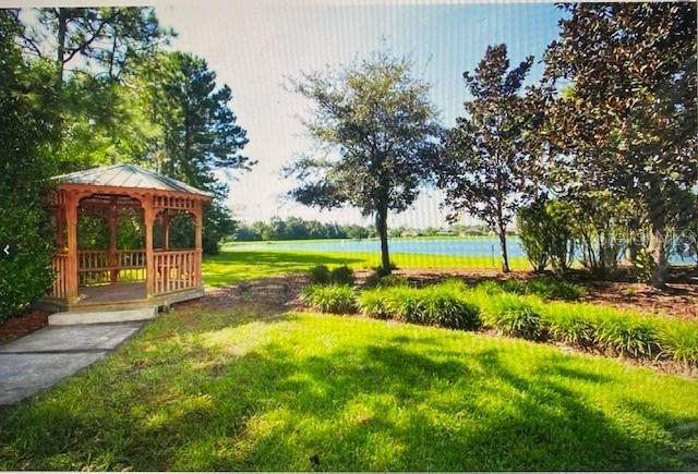 view of home's community featuring a gazebo and a lawn