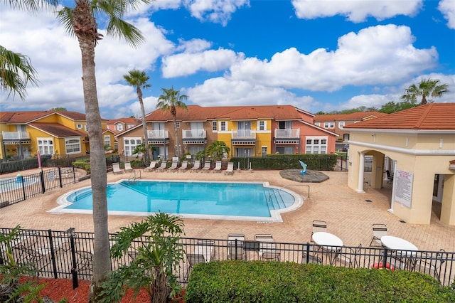 979 Park Terrace Cir, Kissimmee, FL 34746 - pool featuring fence, a patio area, and a residential view