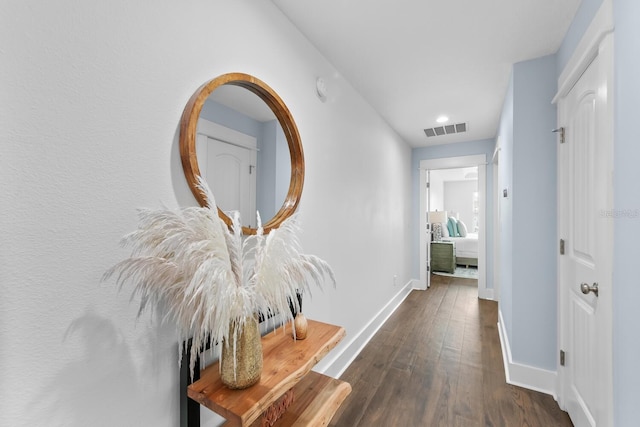 412 5th Ave S, Jacksonville Beach, FL 32250 - hall with baseboards, visible vents, and dark wood-style flooring