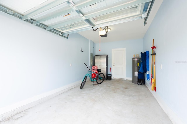 412 5th Ave S, Jacksonville Beach, FL 32250 - garage featuring water heater and baseboards