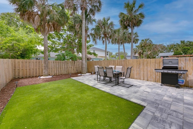 412 5th Ave S, Jacksonville Beach, FL 32250 - view of yard with a fenced backyard and a patio area