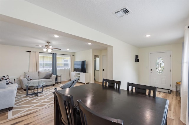 dining area with visible vents, baseboards, recessed lighting, a ceiling fan, and light wood-type flooring