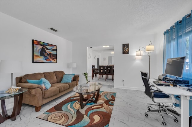8720 Larwin Ln, Orlando, FL 32817 - office featuring marble finish floor, a textured ceiling, baseboards, and visible vents