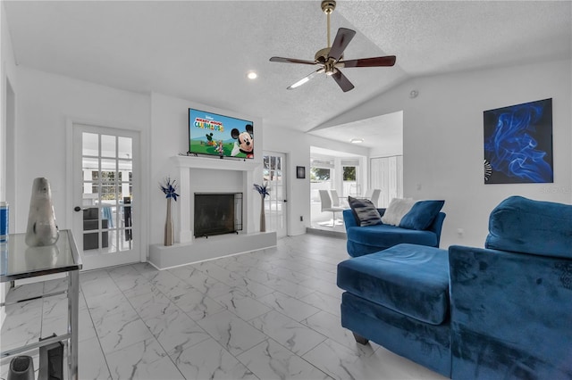 8720 Larwin Ln, Orlando, FL 32817 - living room with lofted ceiling, a fireplace with raised hearth, a textured ceiling, marble finish floor, and ceiling fan