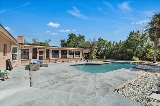 8720 Larwin Ln, Orlando, FL 32817 - outdoor pool with an outdoor hangout area and a patio