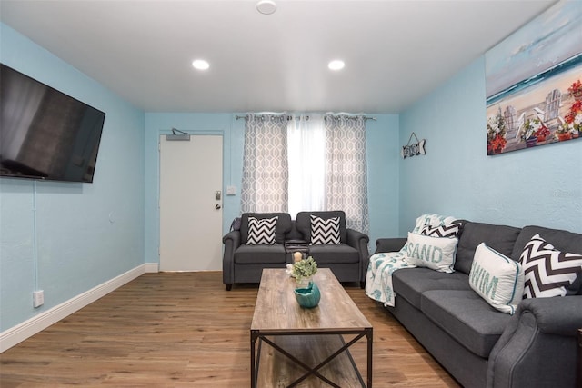 103 Mason Park Dr, Daytona Beach, FL 32117 - living room with light wood-style floors, baseboards, and recessed lighting