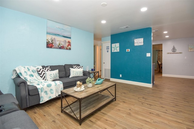 103 Mason Park Dr, Daytona Beach, FL 32117 - living room featuring recessed lighting, light wood finished floors, visible vents, and baseboards