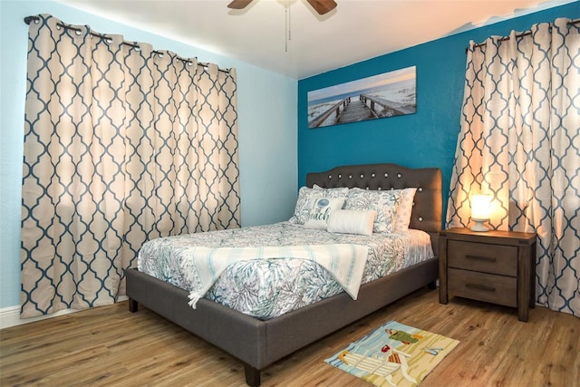 103 Mason Park Dr, Daytona Beach, FL 32117 - bedroom featuring wood finished floors and a ceiling fan