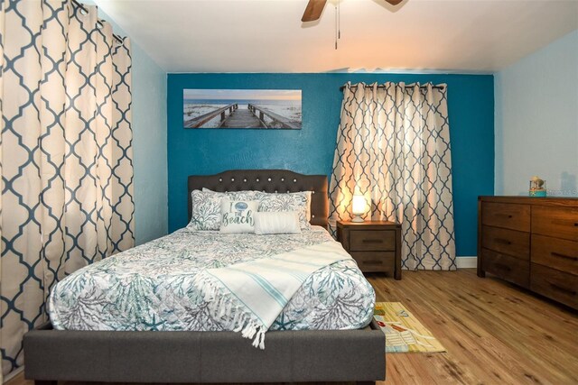 103 Mason Park Dr, Daytona Beach, FL 32117 - bedroom featuring ceiling fan and wood finished floors