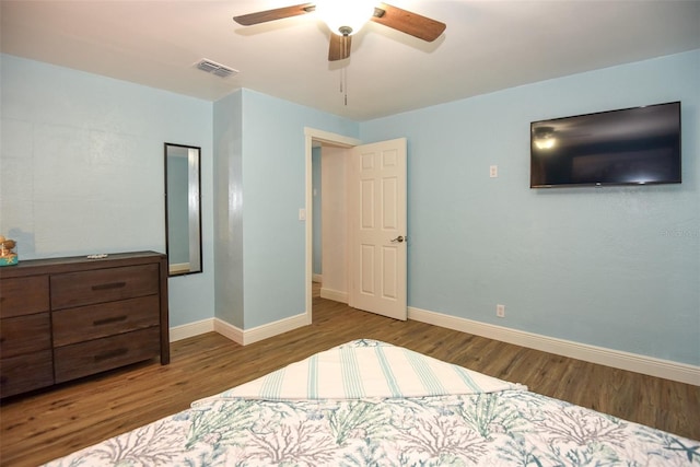 103 Mason Park Dr, Daytona Beach, FL 32117 - bedroom featuring visible vents, baseboards, ceiling fan, and wood finished floors