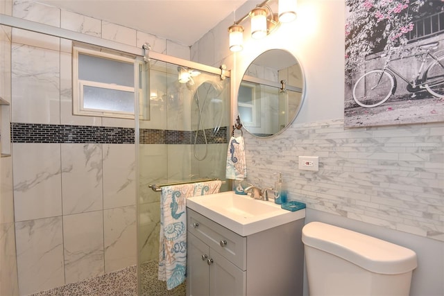 103 Mason Park Dr, Daytona Beach, FL 32117 - full bath with toilet, a stall shower, vanity, and tile walls